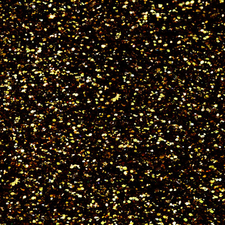 Night Gold glitter texture sparkling shiny background for Christmas card. Twinkly golden glitter lights grunge backgroundの写真素材