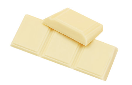 White chocolate pieces isolated on white background. Chocolate Package design elements. Top view. Flat layの写真素材