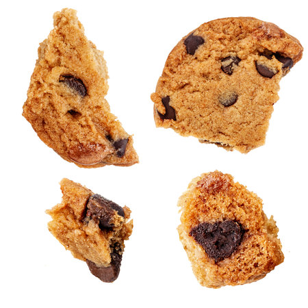 Levitating chocolate chip cookies isolated on white background. Flying Cookies piecesの写真素材