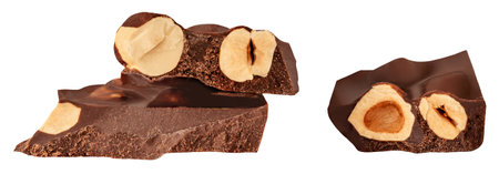 Broken Chocolate pieces isolated on white. Dark organic Chocolate with hazel nuts close upの写真素材
