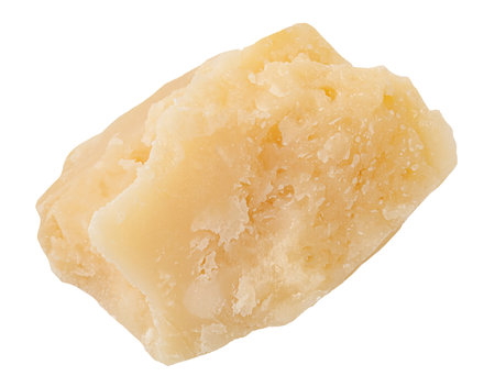 Parmesan cheese piece isolated. Broken Parmesan cheese piece on white.の写真素材