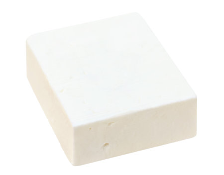 Feta cheese isolated. Greek fitaki cheese pieces on white background. Fresh soft cheese block Top view. Package design elementの写真素材