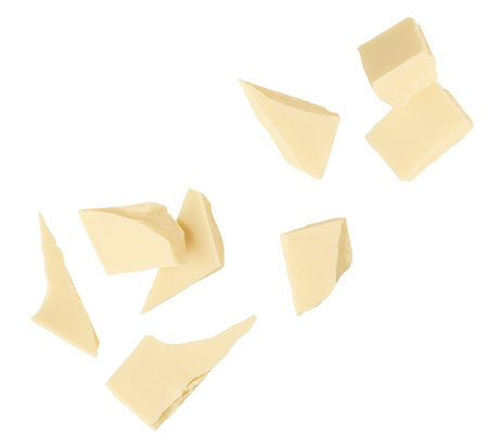 Isolated White Chocolate bar Explosion. Levitating milk chocolate pieces shattering on white background. Falling Chocolate chunks. Package design elementの写真素材