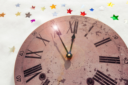 Happy New Year background vintage watches. Celebration background. Greeting card. The Christmas sparkling decorations. New Year's background.の写真素材