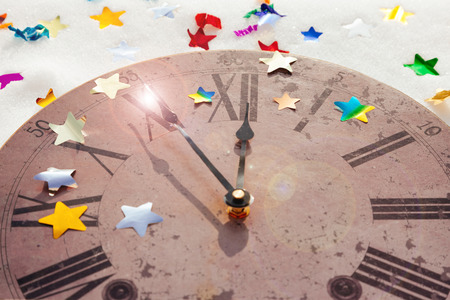 Happy New Year background vintage watches. Celebration background. Greeting card. The Christmas sparkling decorations. New Year's background.の写真素材