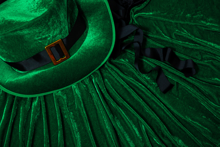 A St. Patrick's day costume hat of a leprechaun. Green Irish hat is on a green background.の写真素材