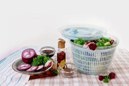Centrifugal dryer for salad. Mechanical dryer for greens with spices, cabbage and seasonings.の写真素材