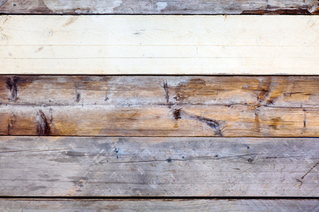Background of Wooden boards of different colors. Wood material background for Vintage wallpaper.の写真素材