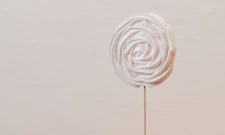 White Cake on white paper delivery box on the Set Sail Champagne background.の写真素材