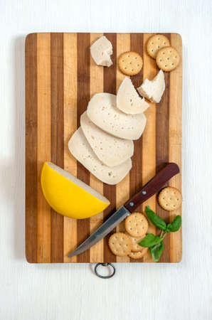 Slices of Holland cheese Edam and dutch goat cheese from Netherlands, top view.の写真素材