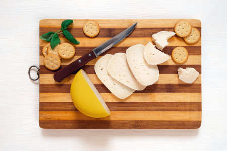 Slices of Holland cheese Edam and dutch goat cheese from Netherlands, top view.の写真素材