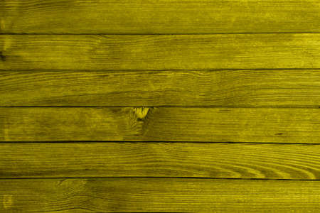 Empty yellow and gold wooden backgroundの写真素材