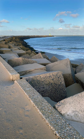Landscape of North Sea in Winter with Strong Wind. Mystical Seashore with Light and Shadow.の写真素材