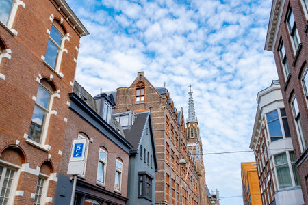 Typical Dutch cityscape on the sunny day with streets, a calm canal, parks, houses. The Hague, Netherlandsの写真素材