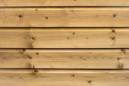 Top view of wood or plywood for backdrop, yellow wooden background with nature patternの写真素材