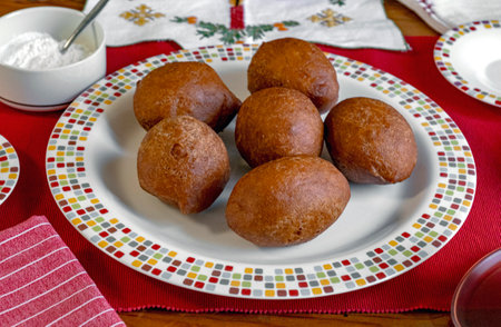 The typical Dutch food Olie Bollen, it is traditional Netherlands Donuts that Dutch people eat during Christmas and New Yearの写真素材
