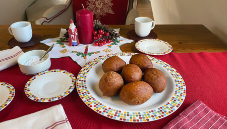 The typical Dutch food Olie Bollen, it is traditional Netherlands Donuts that Dutch people eating during Christmas and New Yearの写真素材