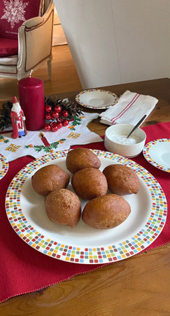 The typical Dutch food Olie Bollen, it is traditional Netherlands Donuts that Dutch people eating during Christmas and New Yearの写真素材