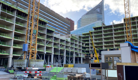 The construction site with equipment and building materials. Construction of a new residential building in the city center The Hague, Netherlands.の写真素材