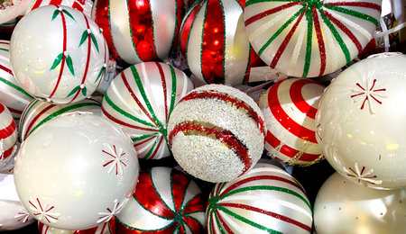 Background of white and red Christmas toys. New Year, top view, close-upの写真素材