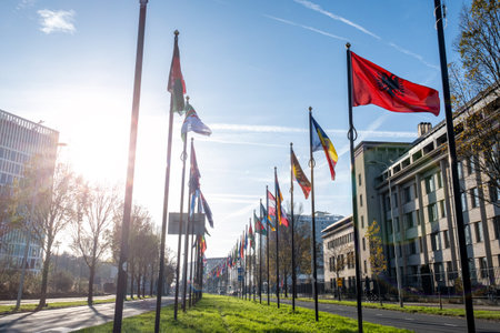 Alley or a street with many flags of different countries. Parade of flags near the World Forum in The Hague, Netherlands.の写真素材