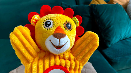 Bright yellow hand puppet animal interactive toy little lion cub for baby up to 1 yearの写真素材