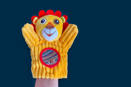Bright yellow hand puppet animal interactive toy little lion cub for baby up to 1 yearの写真素材