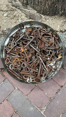 Many old copper iron keys covered with patina, old Dutch vintage keys, top viewの写真素材