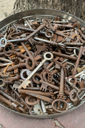 Many old copper iron keys covered with patina, old Dutch vintage keys, top viewの写真素材