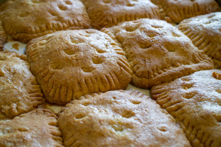 baked goods are fresh and hot. delicious pies fresh from the oven. dessert for breakfast and lunch. homemade sweets.の写真素材