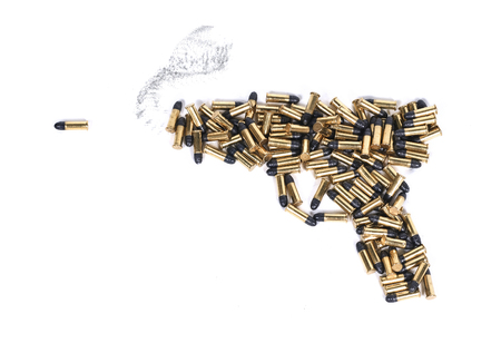 Gun made of ammo isolated against white backgroundの写真素材