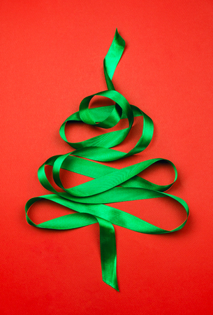 Christmas tree made of green ribbon. Flat lay, concept of Christmas time.の写真素材