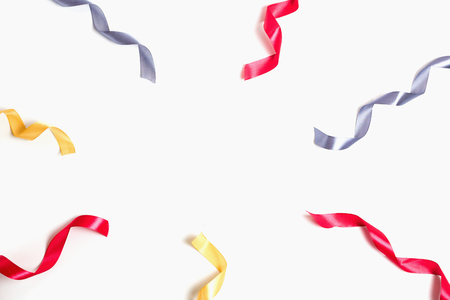 Colorful ribbons on white background, flatlay, holiday concept, copyspaceの写真素材