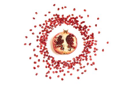 Pomegranate and pomegranate seeds background, white background Pomegranate and pomegranate seeds background, white background