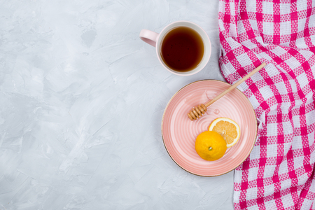 Cup of tea, lemon and syrup, flatlay, copyspaceの写真素材