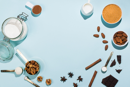Various products for bakery and baking supplies on blue, flatlay frameの写真素材