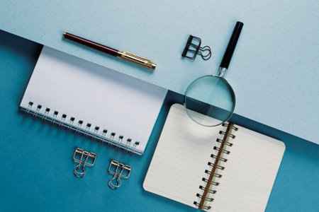 Set of stationery tools on a blue background, flatlay