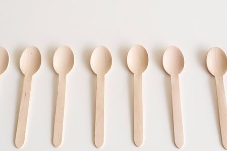 High angle view of bamboo spoons on white tableの写真素材