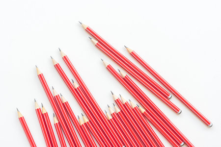 Red HB pencils on white background from agove - back to school conceptの写真素材