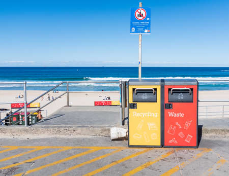 Sydney, Australia - July 18 2019: Waverley Council provides solar powered compactor recycling and waste bins at Bondi Beach, which hold up to 5 times more waste as normal bins.のeditorial素材