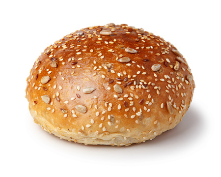 Hamburger bun with sesame and sunflower seeds. Fast food. Isolated on white background.