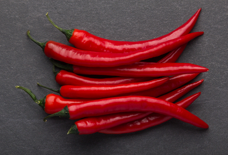 Red hot chili pepper on black backgroundの写真素材