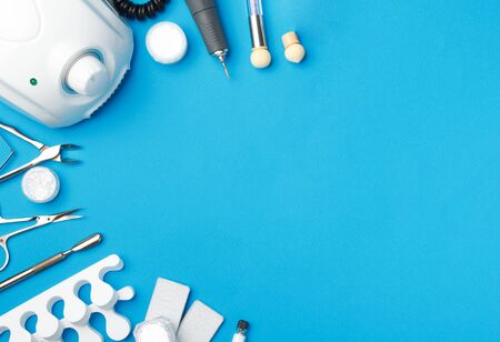 Professional manicure tools on blue background.
の写真素材