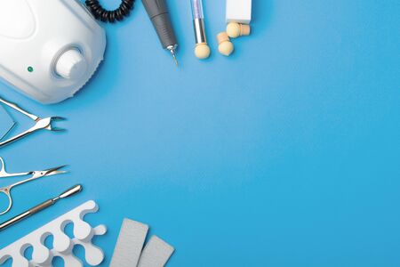 Professional manicure tools on blue background.
の写真素材