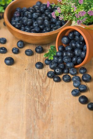 Blueberry on wooden table background. Blueberries closeup. Berries closeupの写真素材