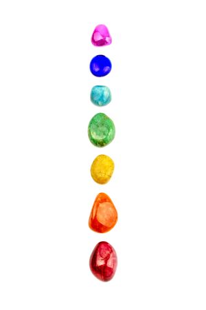 Chakra stones, crystals in a row on white background, isolatedの写真素材