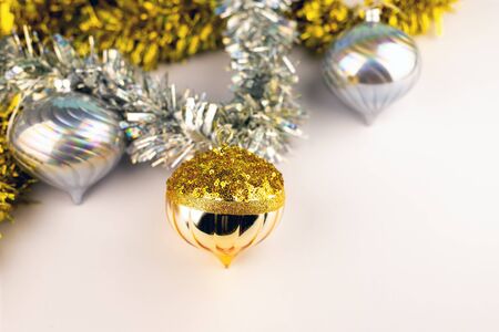 Christmas silver and gold balls and decorations on white backgroundの写真素材