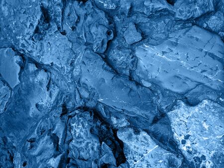 The background or texture of the rock. The surface of the stone. Blue colour toned.の写真素材