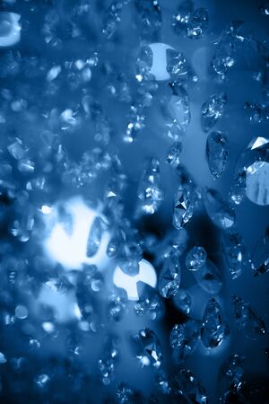 Crystal chandelier close-up. Glamour background blue tonedの写真素材