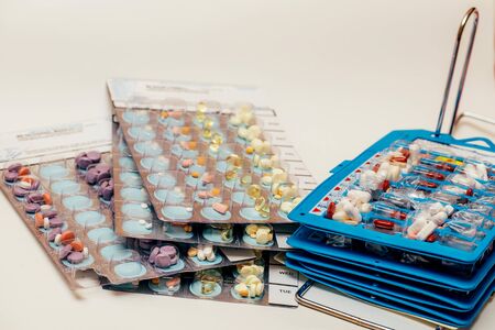 Pills in blisters for every day of the week for the morning, day, night time. Medications for...